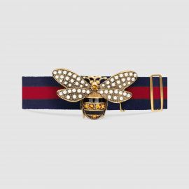 Web belt with bee at Gucci